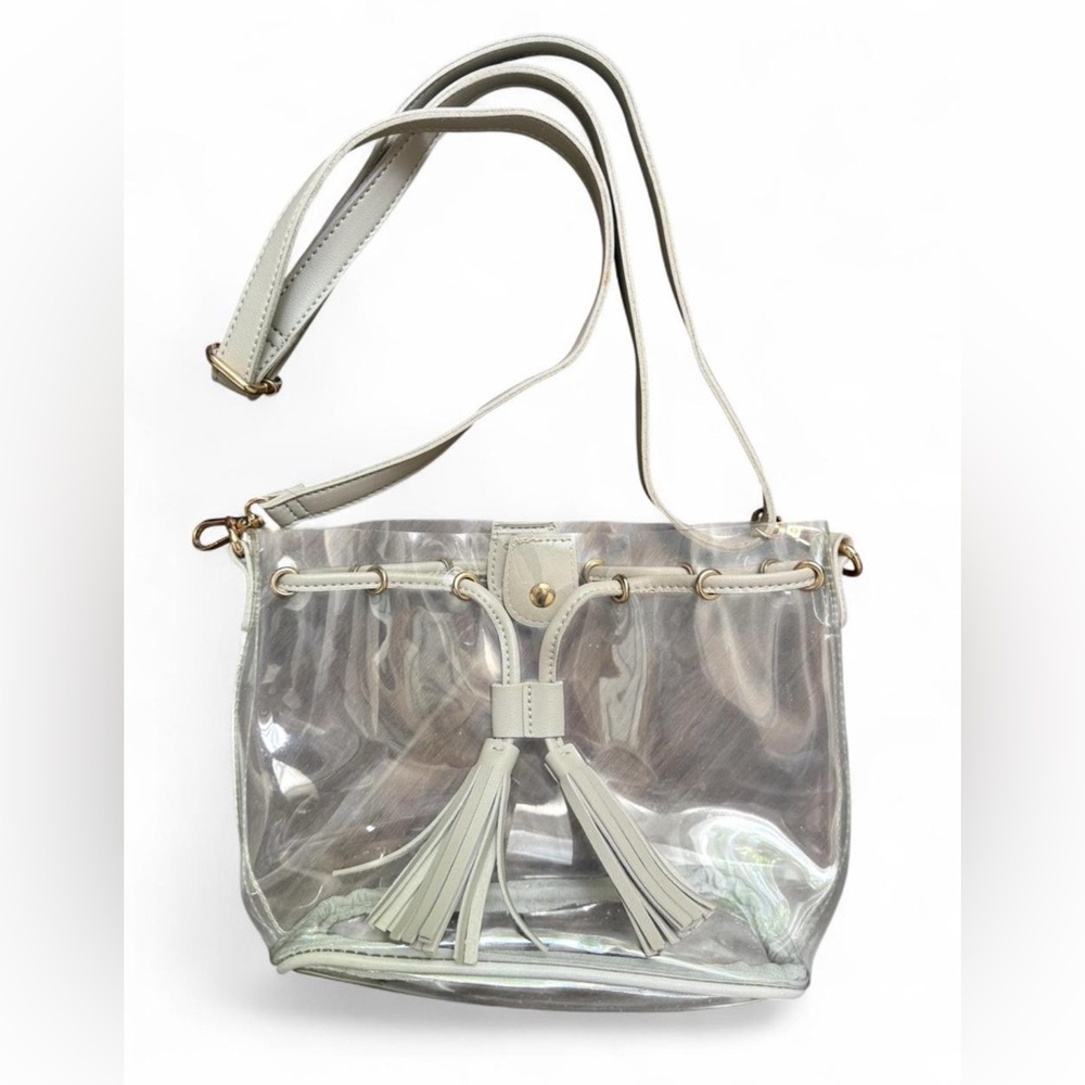 CLEARLEE clear stadium bucket bag. Trimmed in tan faux leather with cute tassels